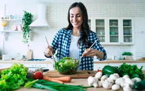 woman preparing a salad