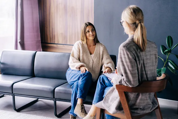 woman talking with her therapist