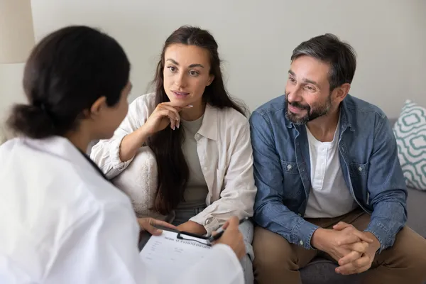 couple consulting with a fertility counselor