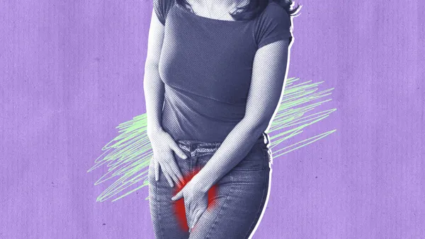 woman covering her genitalia due to lichen sclerosus