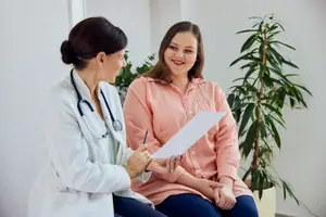 doctor talking with patient about birth control