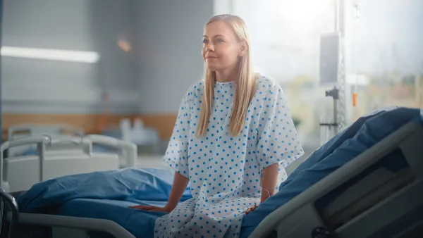 woman smiling after minimally invasive gynecologic surgery