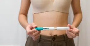 woman-holding-ivf-injection