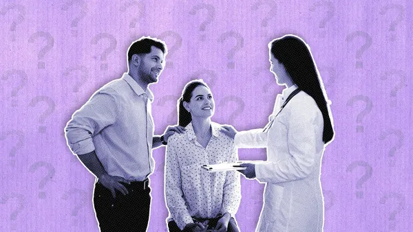couple consulting with their reproductive endocrinologist about subfertility