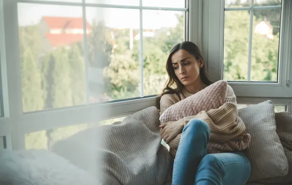 devastated woman after a late-term pregnancy loss