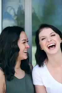 two female friends laughing