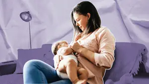 woman breastfeeding her baby