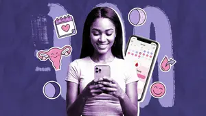 woman-looking-at-period-tracker