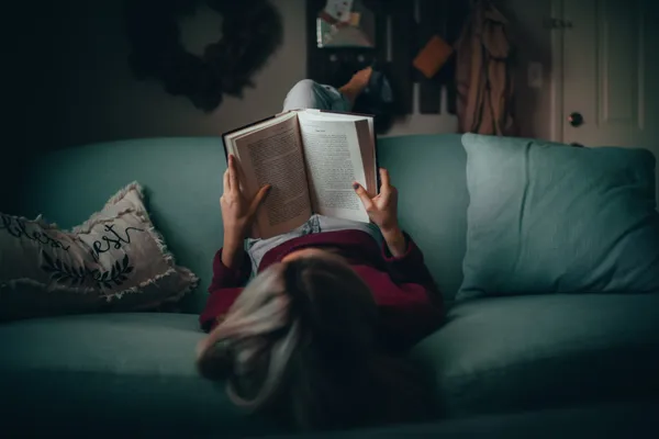 bird's eye view of a woman reading a book