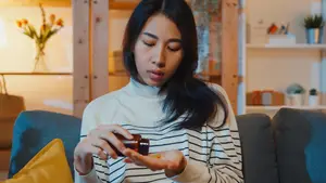 woman-taking-a-pills