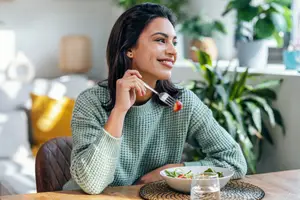 woman eating a salad