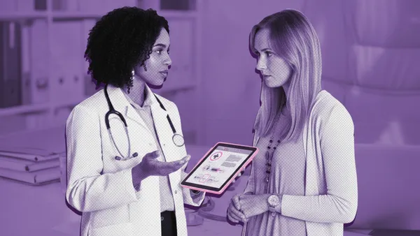 woman talking to fertility doctor about ERA, EMMA, and ALICE tests