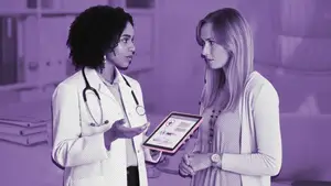 woman talking to fertility doctor about ERA, EMMA, and ALICE tests