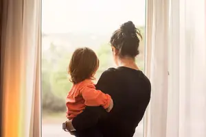 woman-holding-child