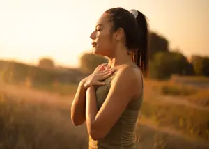 woman practicing mindfulness to manage emotions of pregnancy after loss