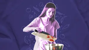 woman cooking vegetables as part of a PCOS diet