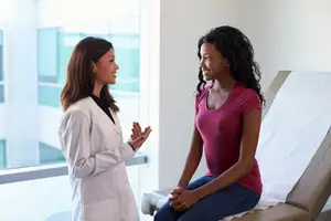 doctor consulting with her patient
