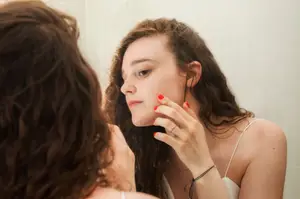 woman-looking-at-skin