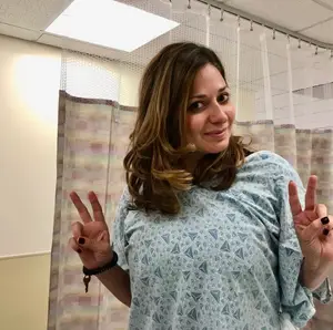 abbe feder in hospital gown