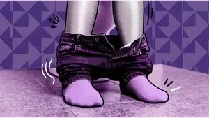 woman on the toilet with her pants around her ankles