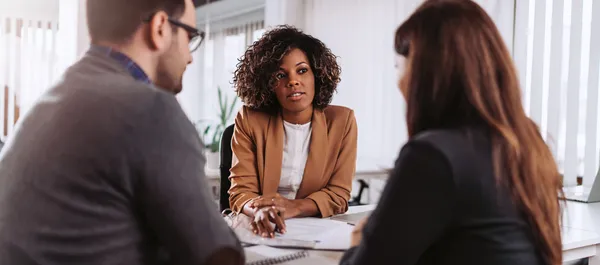 couple working with a surrogacy lawyer