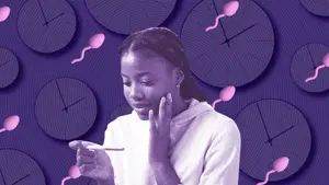 woman-looking-at-pregnancy-test-after-embryo-transfer