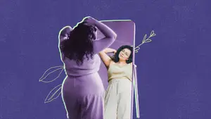 woman looking at herself in the mirror