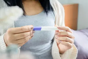 woman-taking-pregnancy-test