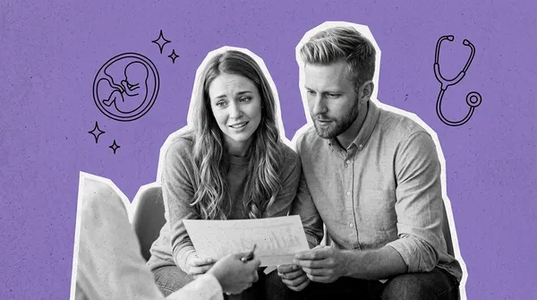 couple consulting with their fertility doctor about fragile x and ivf