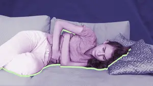 woman struggling with period cramps