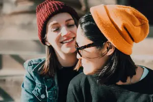 couple sitting on concrete steps