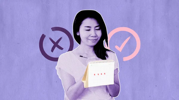 woman marking ovulation on a calendar