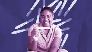 woman-looking-at-pregnancy-test