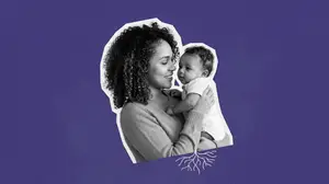 woman cuddling her newborn baby