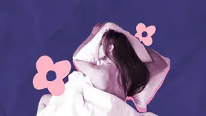 woman in a prone position in bed