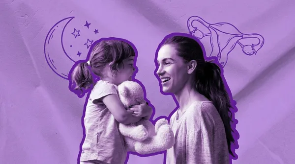 woman playing at home with her young daughter