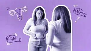 woman-looking-at-belly
