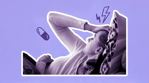 woman with migraine lying down, hand on her head