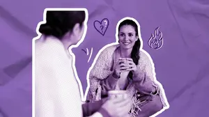 two women drinking tea and talking