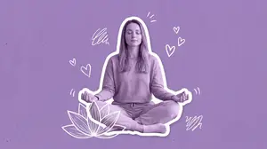 woman meditating at the beach