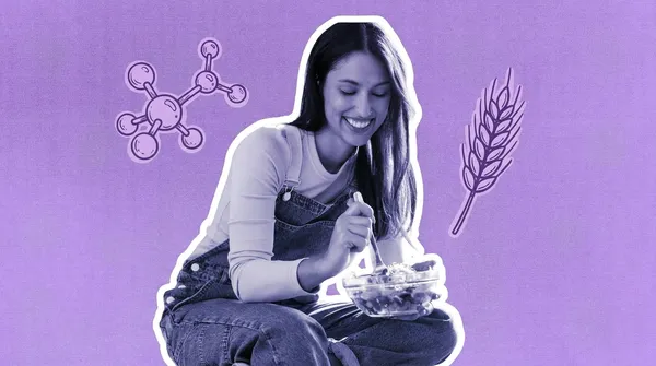 woman eating a salad in the kitchen