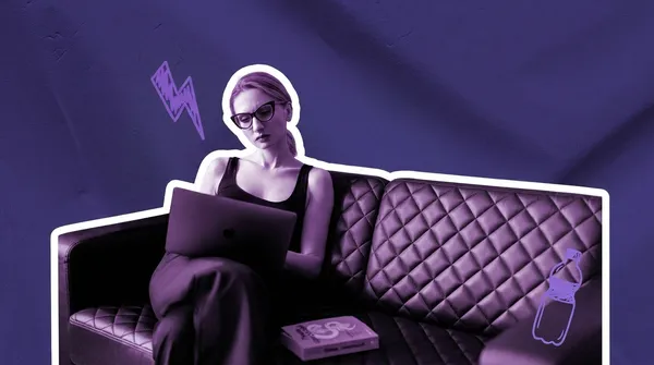 woman working on the sofa in her office